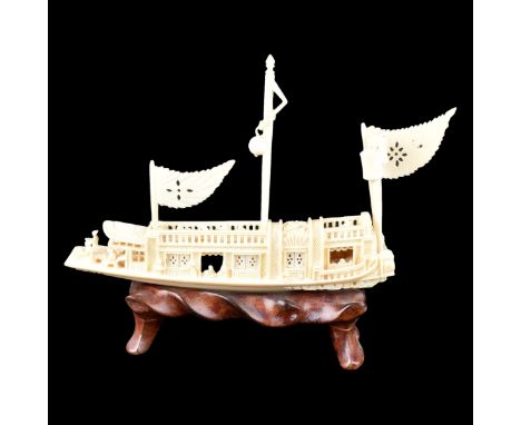 Antique Chinese Carved Ivory Carving of a River Boat Mounted on Wooden Stand. Detailed with figures, pierced windows, doorway