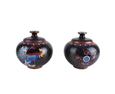 Pair of Chinese Cloisonne Enamel Covered Jars. Export seal mark to base of one jar. Measures 5-1/2" H x 5" W Condition: Good 