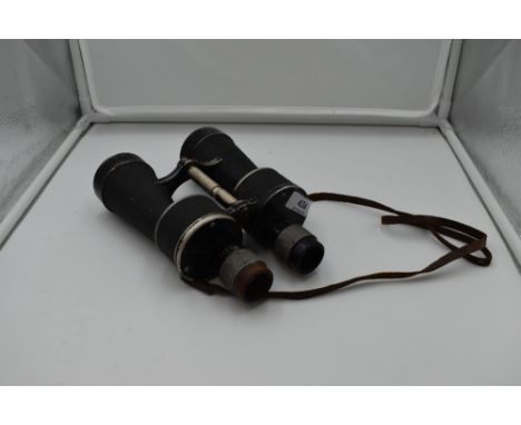 A pair of 7 x 50 Kriegsmarine WW2 binoculars (Porro II type) marked to the left side 'M 33319 N' with eagle and swastika engr