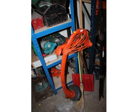 A FLYMO STRIMMER + FOUR HAND GARDEN TOOLS