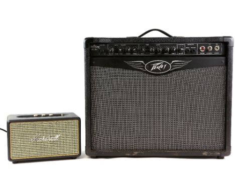 Peavey ValveKing VF 112 amplifier and a Marshall speaker (2).        Not electronically tested. We recommend a qualified elec