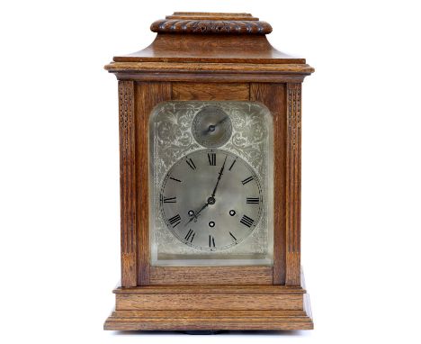 A German oak cased mantle clock by Gustav Becker, with silvered Roman dial, having chiming gong, H.48cm W.30cm D.19cm        