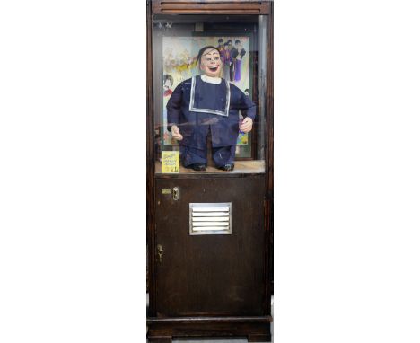 Large amusement arcade automaton, 'Laugh with Jolly Jack', in glazed case with later painted Beatles 'I am the Walrus' backgr