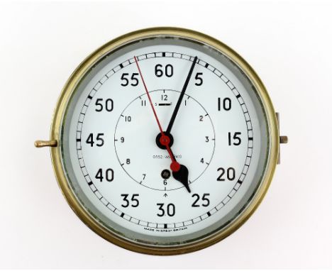 Early 20th century wall hanging calendar, diameter 25cm, together with a mahogany, glass and brass cased clock and barometer 