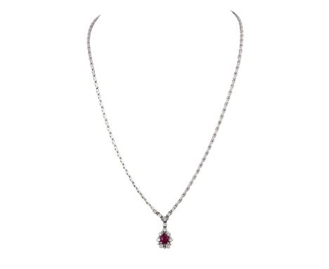 Collier mit Rubintropfen ca. 0,7 ct und Brillanten von zus. ca. 0,28 ct, gute Farbe und Reinheit, WG 14K, 12,2 g, L: 42 cm, 2