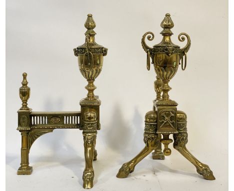 An ornate pair of cast brass fire place and-irons in the Neoclassical style, circa 1900, each with a twin handled urn finial 