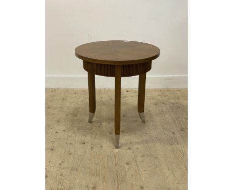 A contemporary oak lamp table, the circular top above a reeded frieze, raised on square tapered and splayed supports terminat