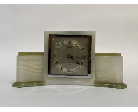 A 1950's green and white Onyx mantel clock in the Art Deco style by Elliott, the silvered dial with Roman chapter ring inscri