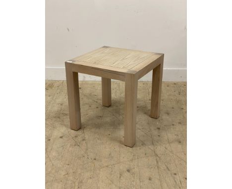 A contemporary lamp table, the panelled top on square section supports. H