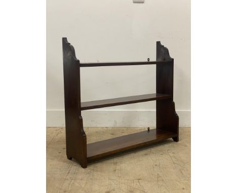 A late 19th century mahogany three tier waterfall wall shelf. H70cm, W77cm, D22cm.&nbsp;