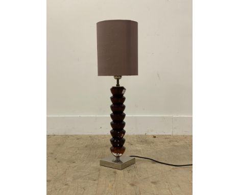 A contemporary table lamp, the acrylic column on a chrome base, complete with shade. H71cm.&nbsp;