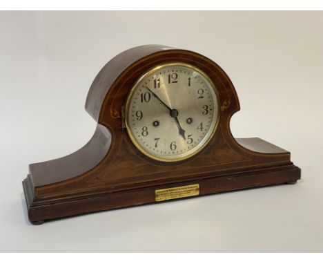 Early 20th century mahogany dome top mantel clock, the case with boxwood and walnut inlay and brass presentation plaque dated