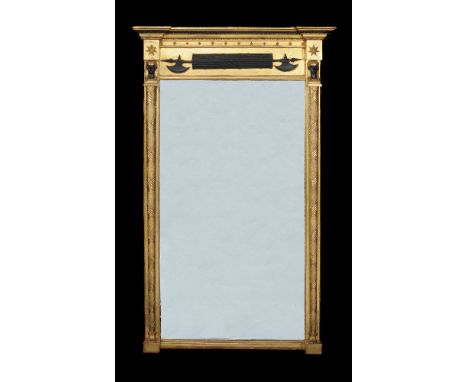 A Regency giltwood, gesso and ebonised wall mirror, circa 1815, the rectangular plate below an egg and dart moulded cornice a