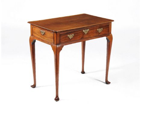 A George II mahogany chamber table, circa 1740, the rectangular dish top above two frieze drawers at each end, a false frieze