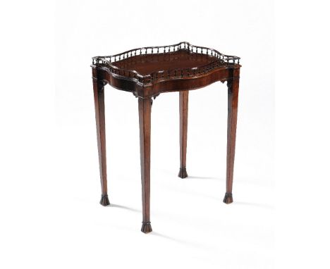 A George III mahogany silver table, circa 1780, in the manner of Thomas Chippendale, with a baluster spindle gallery, 77cm hi