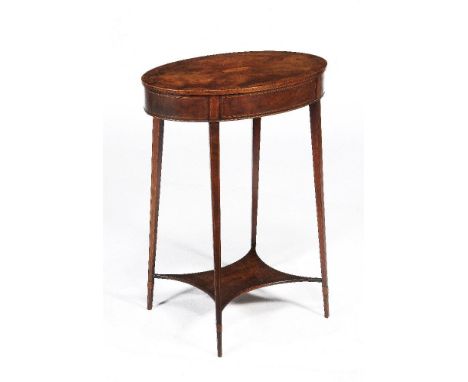 A George III mahogany and inlaid oval occasional table, circa 1790, the top decorated with a radiating stylised fan parquetry