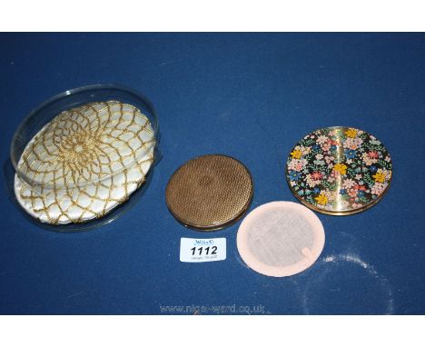 A circular gold coloured beaded cream satin fabric evening Bag, an engine turned finished gold coloured Compact, a cased coba