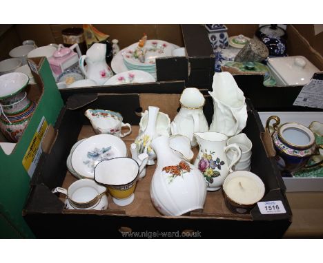 A quantity of Royal Worcester jugs, vases etc