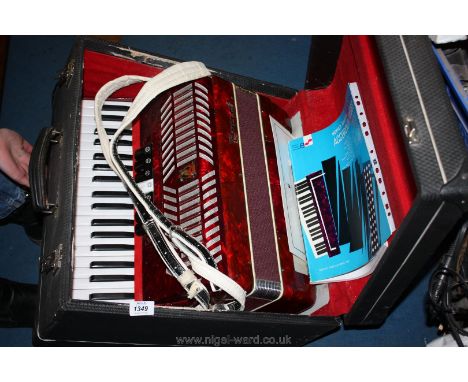 A Parrot Accordion, ninety-six base keys, cased.
