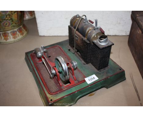 A tin-plate Marklin steam engine plant with double-acting cylinder.