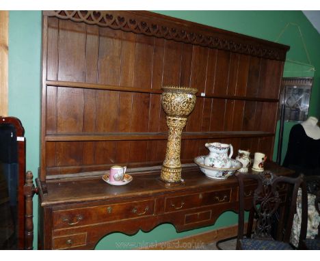 A fine old large Oak Welsh Dresser standing on four square legs and having three frieze drawers and three spice drawers, the 