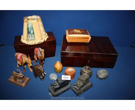 A quantity of treen including a tea caddy, horse, camel and elephant and two coal Land Rover models. etc.,