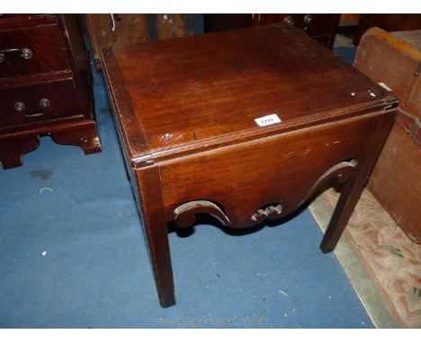A Georgian Mahogany box Commode on square legs, the front and sides  having attractive fretworked details and having  hinged 
