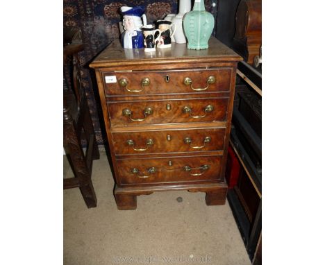 A good Chippendale design Georgian Commode, the cleverly concealed lower section simulating two drawers sliding out to presen