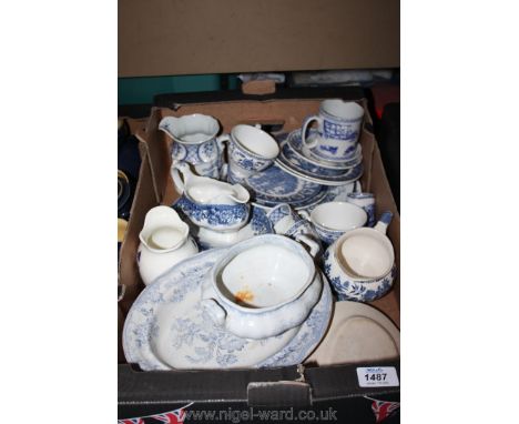 A quantity of blue and white china including Ridgeway sauce boat, jugs, Spode mug, plates etc.