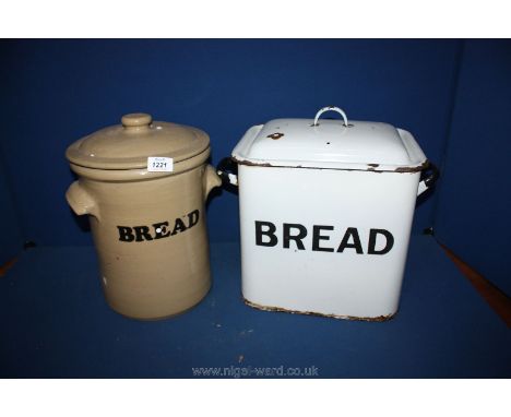 An enamel bread bin and a stoneware bread bin.