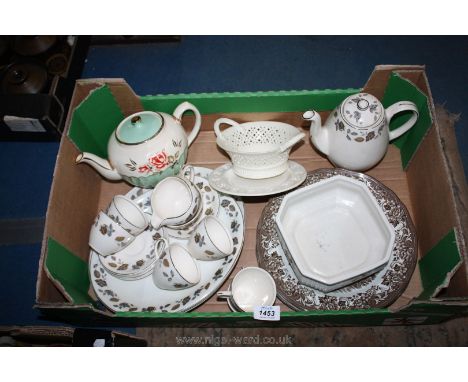 A box of china to include Alfred Meakin teapot, cups and saucers, large oval plates, cream ware dish and stand, five Royal St