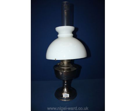 A chrome paraffin Lamp with shade.