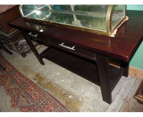 A stylish contemporary Dark Walnut finished Serving/Side Table in the style of an Oriental Altar Table having a pair of friez