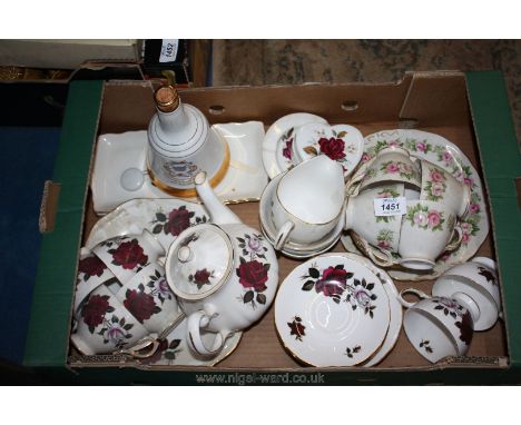 A box of china including Colclough design teapot, red rose cake plate, six cups and saucers, sugar and milk bells, whiskey be