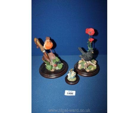 Three Country Artists figures including 'Robin on Trowel', blackbird and poppy and blue tit hanging from tap.