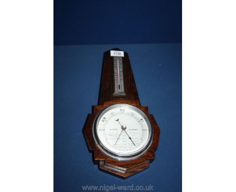 A Banjo barometer and thermometer.