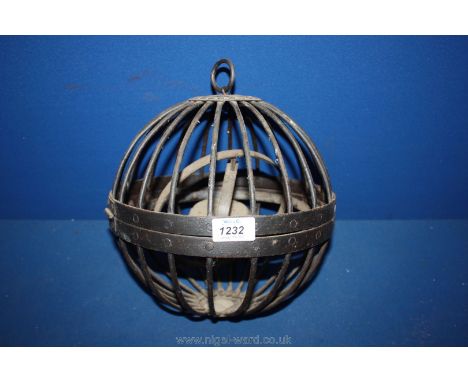 A wrought iron Gimbal Maritime oil Lamp of spherical form with hinged section, approx. 10" diameter.