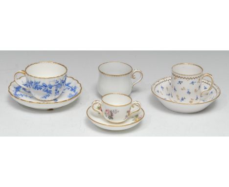 A Sèvres hard-paste coffee can and saucer (gobelet Litron et soucoupe), of the third size, painted with blue flowers and gilt