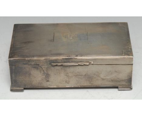 An Art Deco silver rectangular cigarette case, engine-turned, hinged cover, geometric bracket feet, cedar lined, 17.5cm wide,