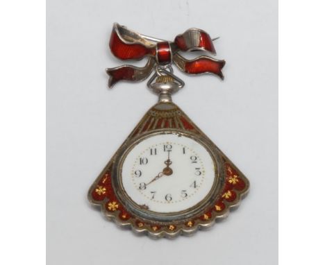 An early 20th century silver coloured metal and enamel fan shaped pendant watch, 2.5cm enamel dial with Arabic numerals, tied