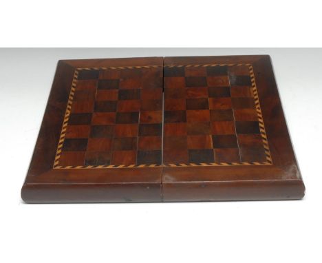 A George III yew games board, the field inlaid for chess and outlined with barber-pole stringing, folding as a book for trave