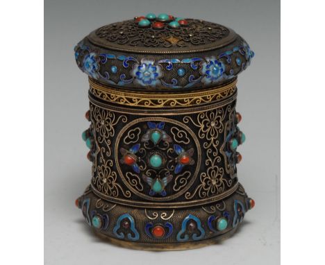 A Chinese silver, silver-gilt, closonne enamel and cabochon mounted cylindrical tea caddy, decorated overallwith scrolls and 