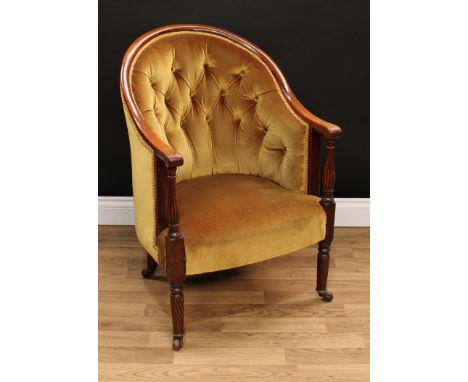 An early Victorian mahogany drawing room chair, in the manner of Gillow of Lancaster, arched back and downswept arms, fluted 
