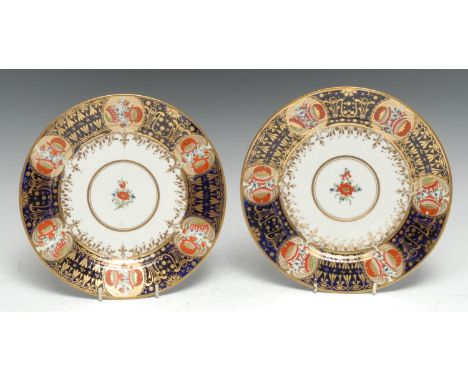 A pair of Chamberlain's Worcester Yeo-type circular dessert plates, typically painted and gilt in the Imari palette, 22cm dia