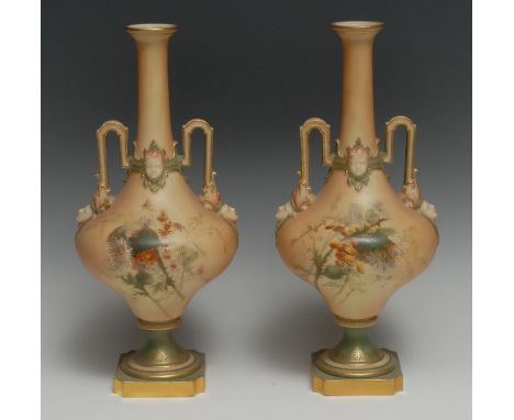 A pair of Royal Worcester two handled pedestal ovoid vases, printed and painted with thistles, in colours on a blush ivory gr