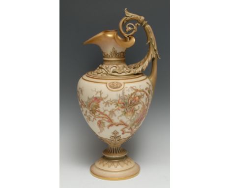 A Royal Worcester ewer, decorated in slightly raised enamels with scrolling folaige in colours on a blush ivory ground, the n