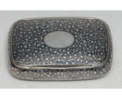 An Austrian silver and niello rounded rectangular snuff box, hinged cover centred by a vacant oval cartouche, 8.5cm wide, c.1