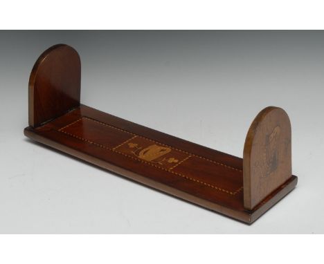 A 19th century Irish Killarney marquetry book slide, arched folding end supports, inlaid with a harp, ferns and shamrocks and
