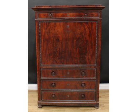 A 19th century Biedermeier flame mahogany secrétaire à abattant, rectangular caddy top above a frieze drawer and a fall front