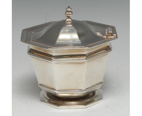 An Edwardian silver octagonal tea caddy, hinged cover with knop finial, skirted base, 11cm wide, Mappin &amp; Webb, London 19